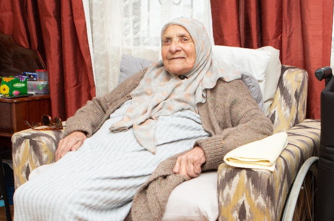 Shariefa “Mama” Khan is the oldest of 108 people to receive a new home. (PHOTO: Misha Jordaan)
