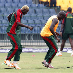 Elijah Otieno and David Obuya warm up during Kenya's training session. (AP)