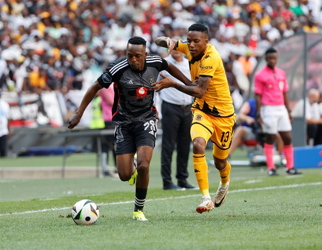 Patrick Maswanganyi of Orlando Pirates challenged by Pule Mmodi of Kaizer Chiefs during the DStv Premiership 2023/24 football match between Orlando Pirates and Kaizer Chiefs at Soccer City in Johannesburg, South Africa on 09 March 2024  