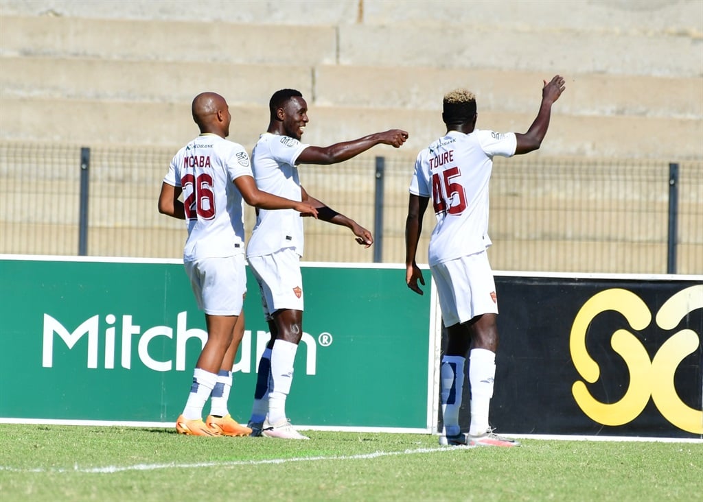 STELLENBOSCH, SOUTH AFRICA - APRIL 13: Anicet Oura of Stellenbosch FC celebrates scoring a goal with team mates during the Nedbank Cup, Quarter Final match between Stellenbosch FC and SuperSport United at Danie Craven Stadium on April 13, 2024 in Stellenbosch, South Africa. (Photo by Grant Pitcher/Gallo Images)