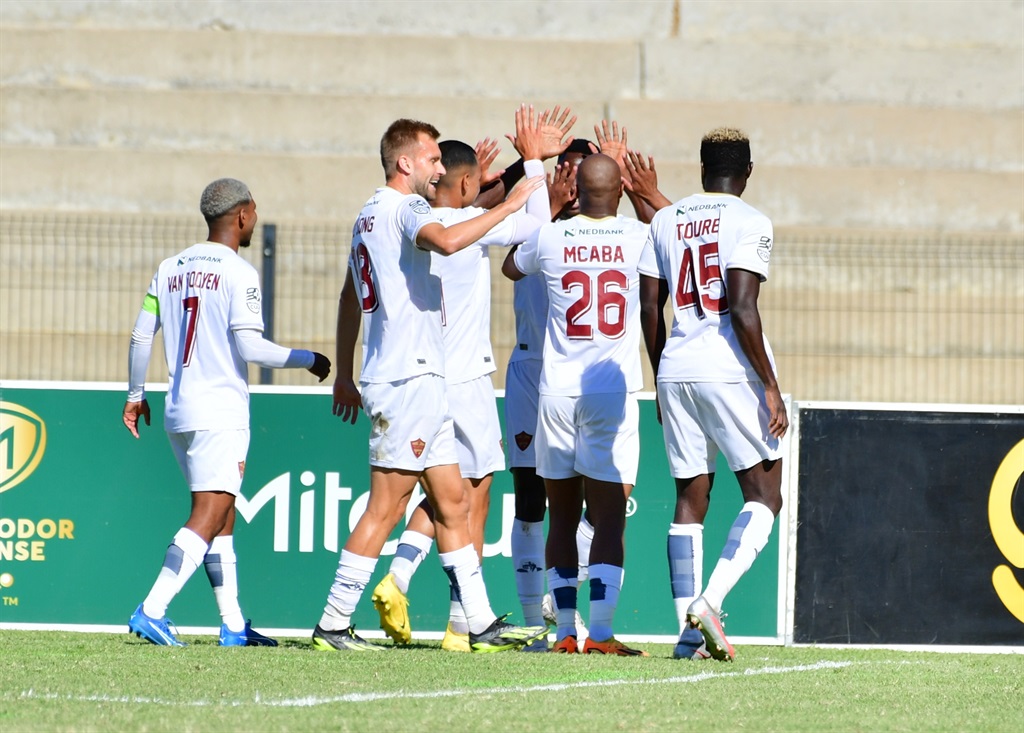 STELLENBOSCH, SOUTH AFRICA - APRIL 13: Anicet Oura of Stellenbosch FC celebrates scoring a goal with team mates during the Nedbank Cup, Quarter Final match between Stellenbosch FC and SuperSport United at Danie Craven Stadium on April 13, 2024 in Stellenbosch, South Africa. (Photo by Grant Pitcher/Gallo Images)