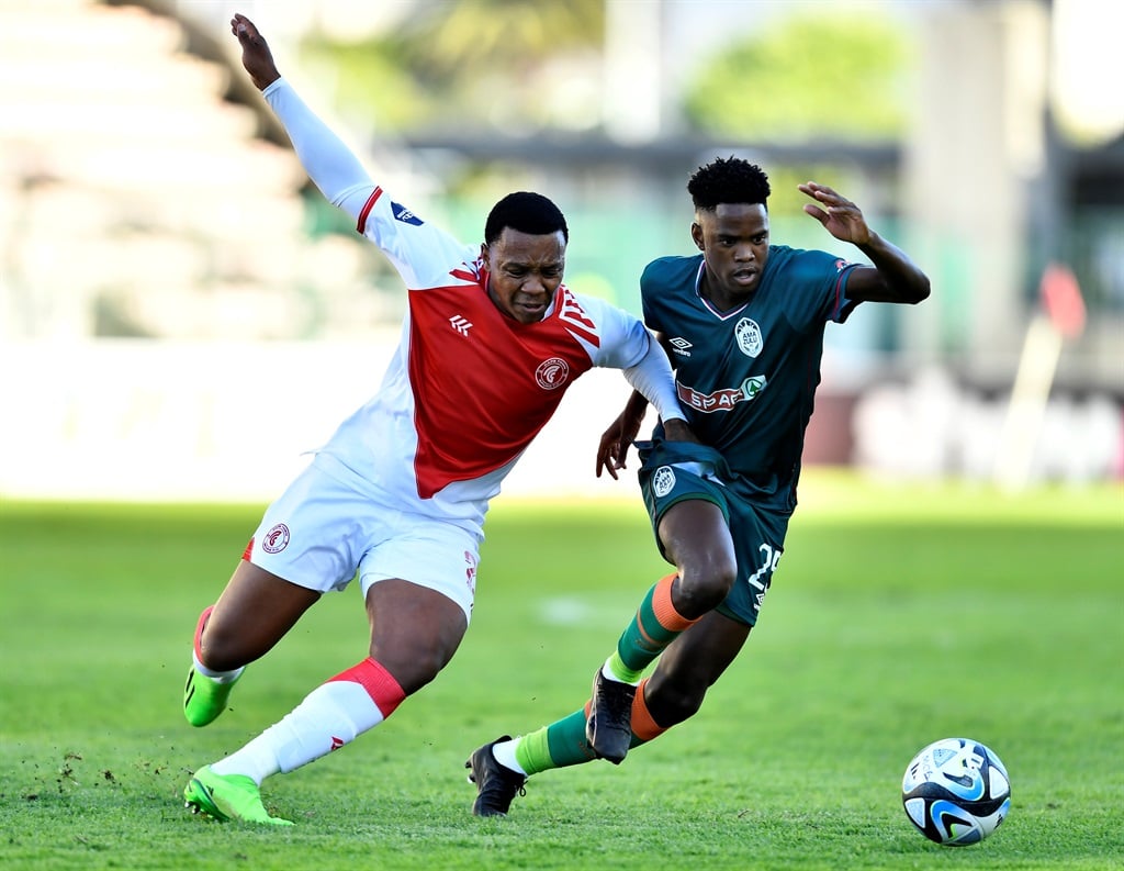 CAPE TOWN, SOUTH AFRICA - FEBRUARY 17: Boitumelo Radiopane of Cape Town Spurs and Sifiso Ngobeni of Amazulu FC during the DStv Premiership match between Cape Town Spurs and  AmaZulu FC at Athlone Stadium on February 17, 2024 in Cape Town, South Africa. (Photo by Ashley Vlotman/Gallo Images)