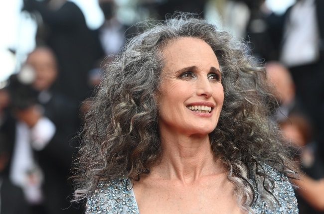 The 63-year-old actress and model walked the 2021 Cannes Film Festival red carpet with new cascading, salt-and-pepper-hued curls. (PHOTO: Gallo Images / Getty Images)
