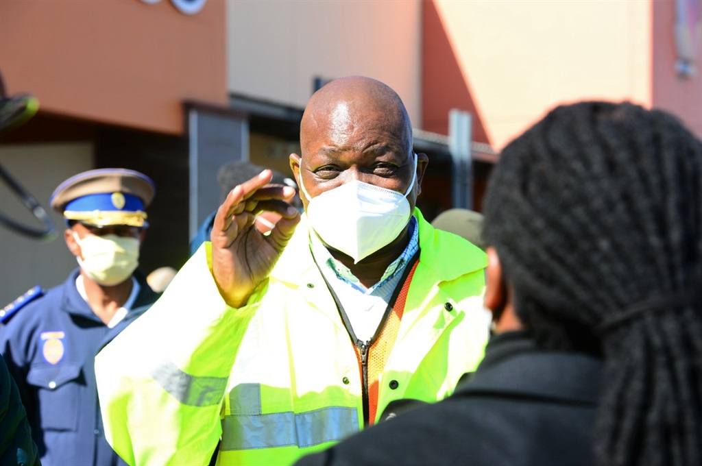 Gauteng Premier visited Chris Hani Crossing Mall in Vosloorus where he pleaded with community leaders to help end the looting of shops in their communities. Photo by Morapedi Mashashe