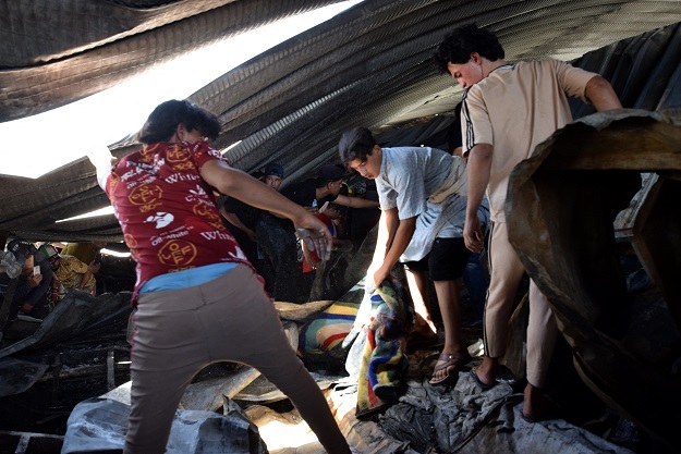 People search for rubble in the ravaged coronavirus