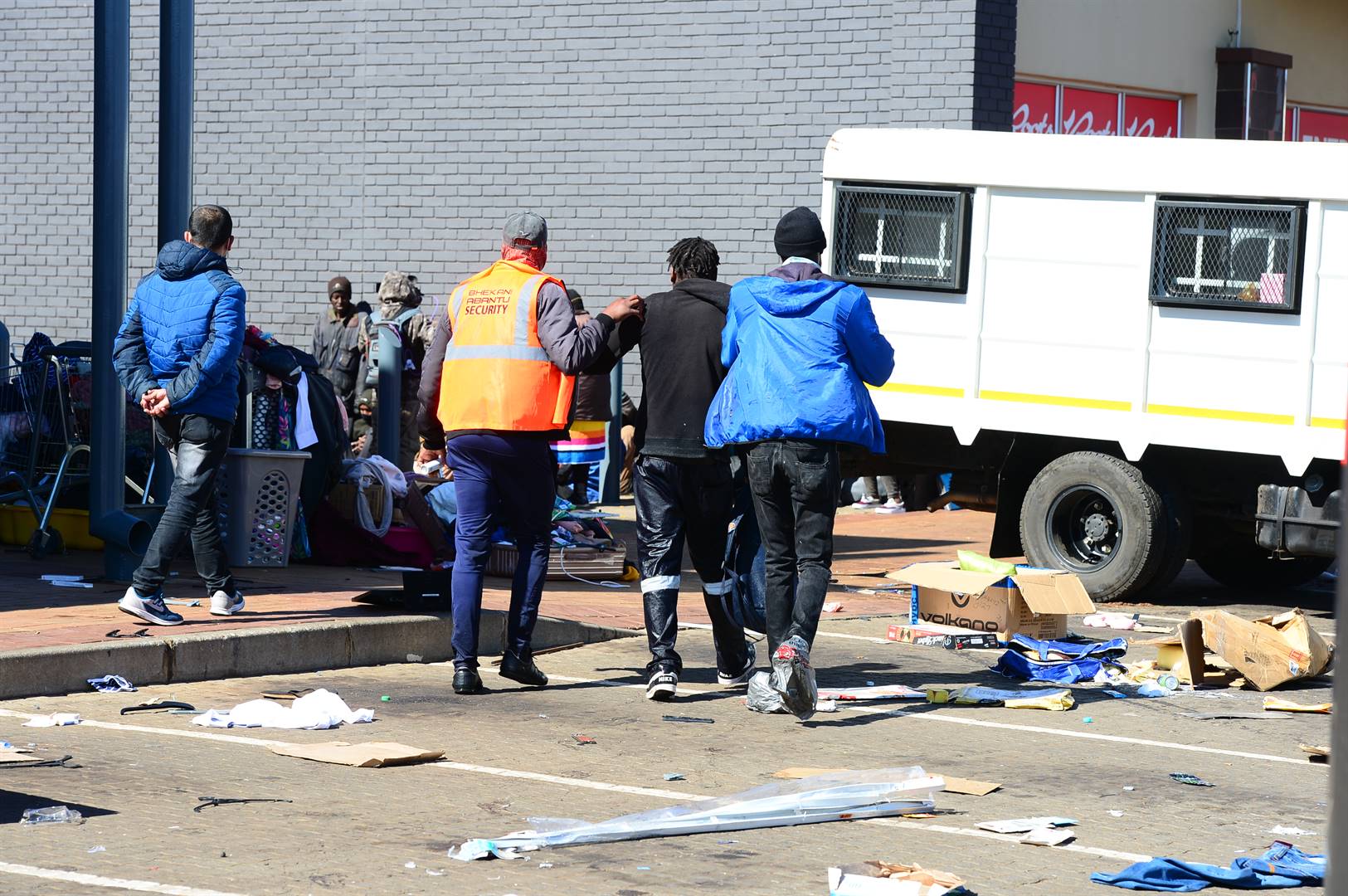 These looters were arrested at Chris Hani Mall in Vosloorus.       Photo by Morapedi Mashashe 