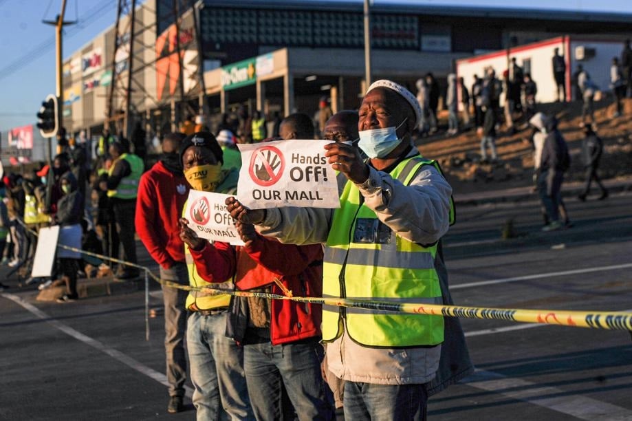 Community members in Tembisa are seen protecting Birch Aches Mall. Photo: Rosetta Msimango/City Press