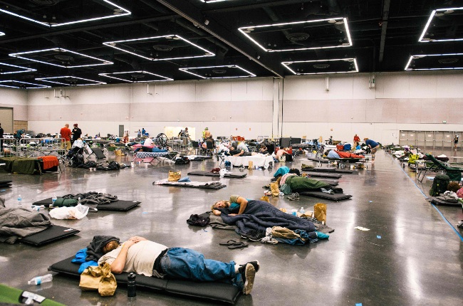 People rest at the Oregon Convention Centre cooling station in Portland, USA, during the record-setting heatwave. (PHOTO: Gallo Images / Getty Images)