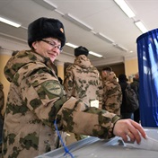 Polls open in Russian vote to extend Putin's reign