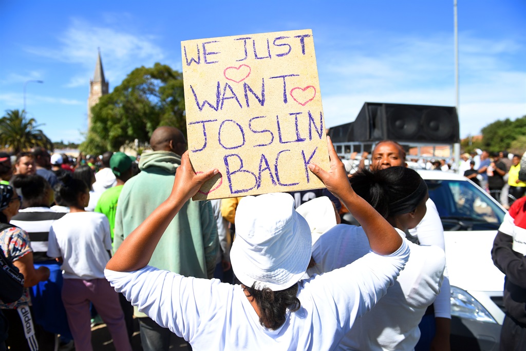 Community members protest outside the Vredenburg Magistrates' Court, on 13 March 2024, during the court appearance of the four suspects implicated in the disappearance of Joslin Smith. The Grade 1 Diazville Primary School pupil was last seen on 19 February wearing a light blue T-shirt and light blue denim shorts. 