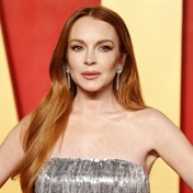 Lindsay Lohan talks postpartum body pressure and tells other moms to give themselves time 