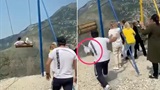Video captured two women flung off a swing at the edge of a 2km Russian cliff. Both survived.