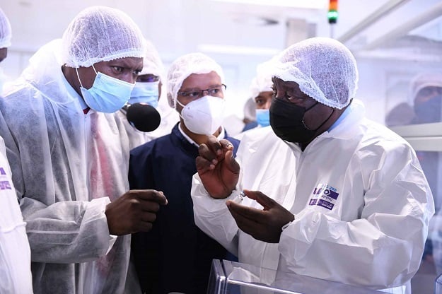 President Cyril Ramaphosa (right) pictured during a visit at Aspen's lab in March. 