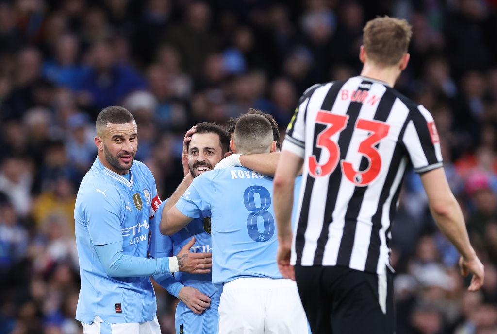 MANCHESTER, ENGLAND - MARCH 16: Bernardo Silva of Manchester City celebrates scoring his teams second goal with teammates during the Emirates FA Cup Quarter Final match between Manchester City and Newcastle United at Etihad Stadium on March 16, 2024 in Manchester, England. (Photo by Alex Livesey/Getty Images)