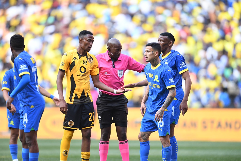 Referee Skhumbuzo Gasa and players during the MTN8 semi final, 1st leg match between Kaizer Chiefs and Mamelodi Sundowns at FNB Stadium on September 02, 2023 in Johannesburg, South Africa. 