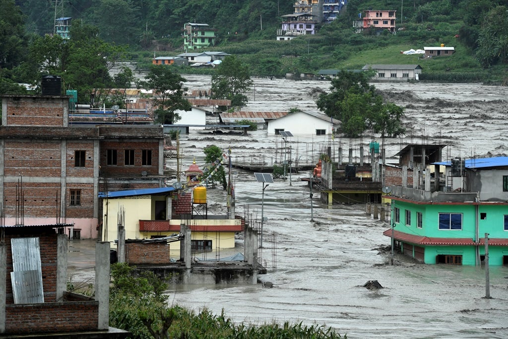 Six people died following floods and landslides in Nepal over the weekend as recue workers continue to search for 28 people who have been missing since Saturday. File image. 