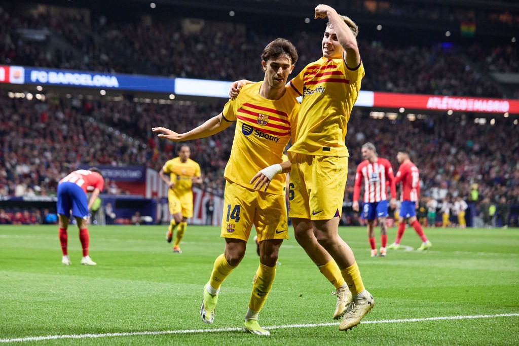 MADRID, SPAIN - MARCH 17: Joao Felix of FC Barcelona celebrates after scoring their sides first goal with his teammates Fermin Lopez of FC Barcelona during the LaLiga EA Sports match between Atletico Madrid and FC Barcelona at Civitas Metropolitano Stadium on March 17, 2024 in Madrid, Spain. (Photo by Alvaro Medranda/Quality Sport Images/Getty Images)
