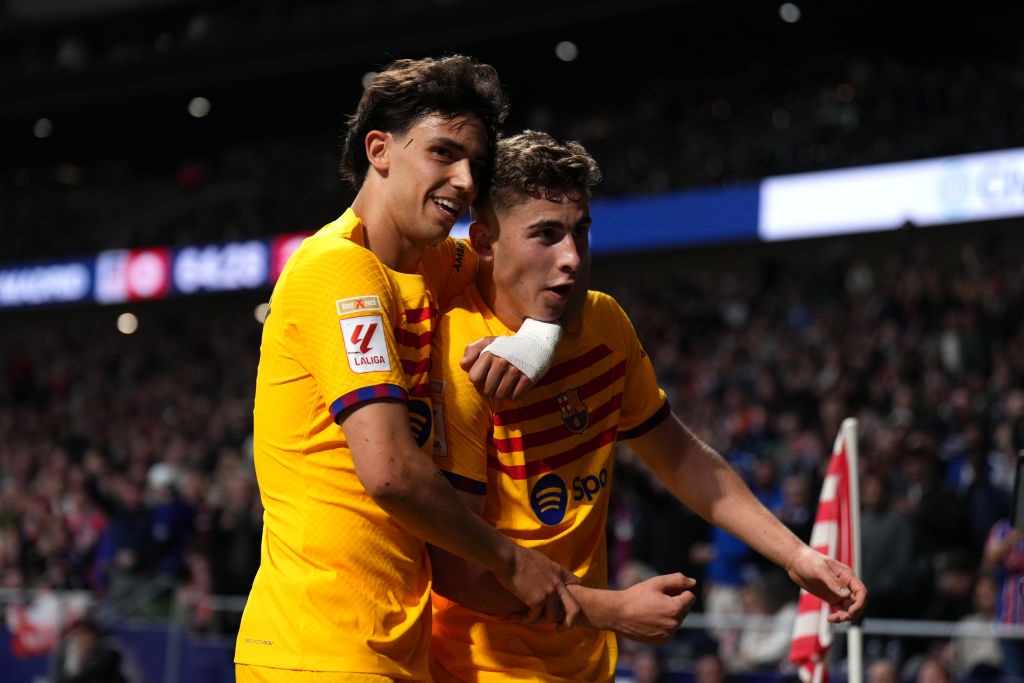 MADRID, SPAIN - MARCH 17: Fermin Lopez of FC Barcelona celebrates scoring his teams third goal with teammate Joao Felix during the LaLiga EA Sports match between Atletico Madrid and FC Barcelona at Civitas Metropolitano Stadium on March 17, 2024 in Madrid, Spain. (Photo by Angel Martinez/Getty Images)