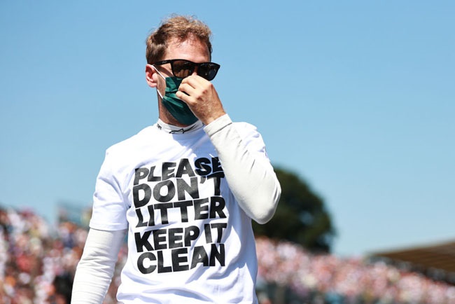 Sebastian Vettel of Germany and Aston Martin F1 Team prepares to drive on the grid before the F1 Grand Prix of Great Britain at Silverstone on July 18, 2021 in Northampton, England.