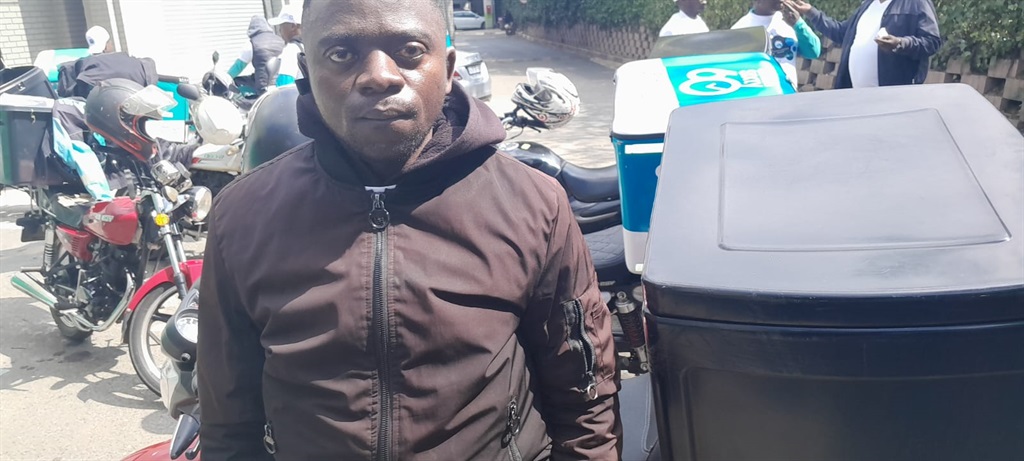 
Timothy Chirwa a motorbike driver who delivers food and groceries says they live in fear while at work. Photo by Happy Mnguni