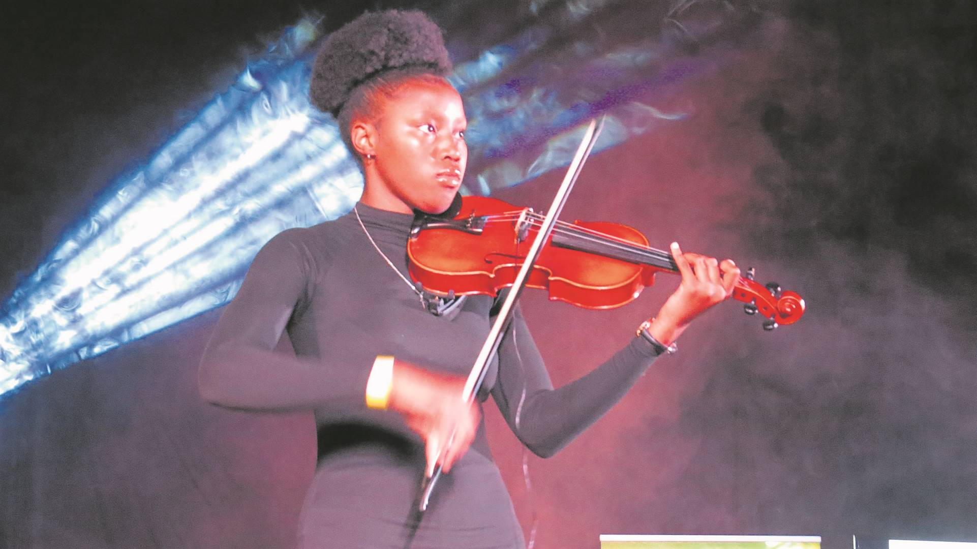 Olivia Seekoei, violinist, performing a solo at the Heidedal Music Expo held in the Norman Doubell Hall on Friday.Photos: Teboho Setena