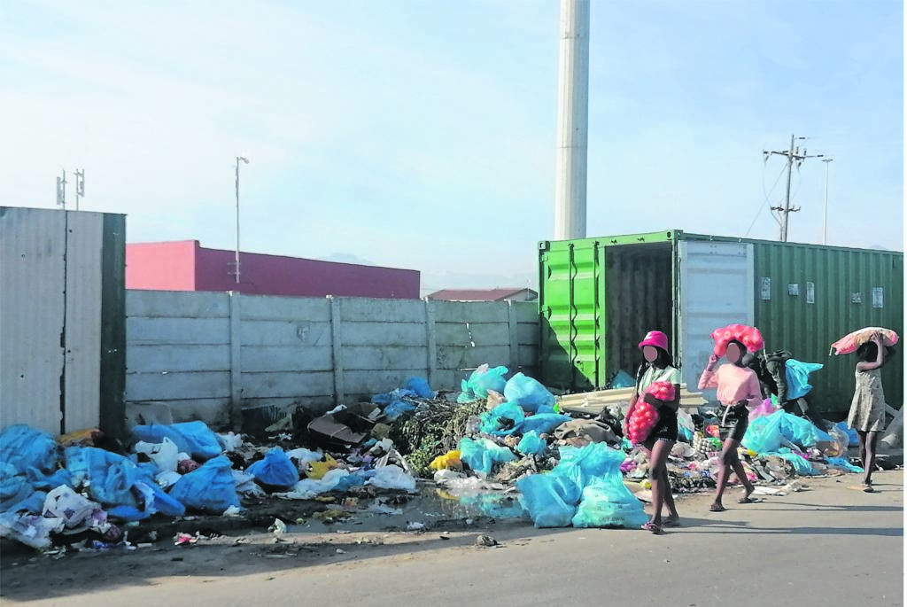 Rubbish dumped outside the container along Mew Way, near Ndlovini informal settlement in Khayelitsha. PHOTO: UNATHI OBOSE