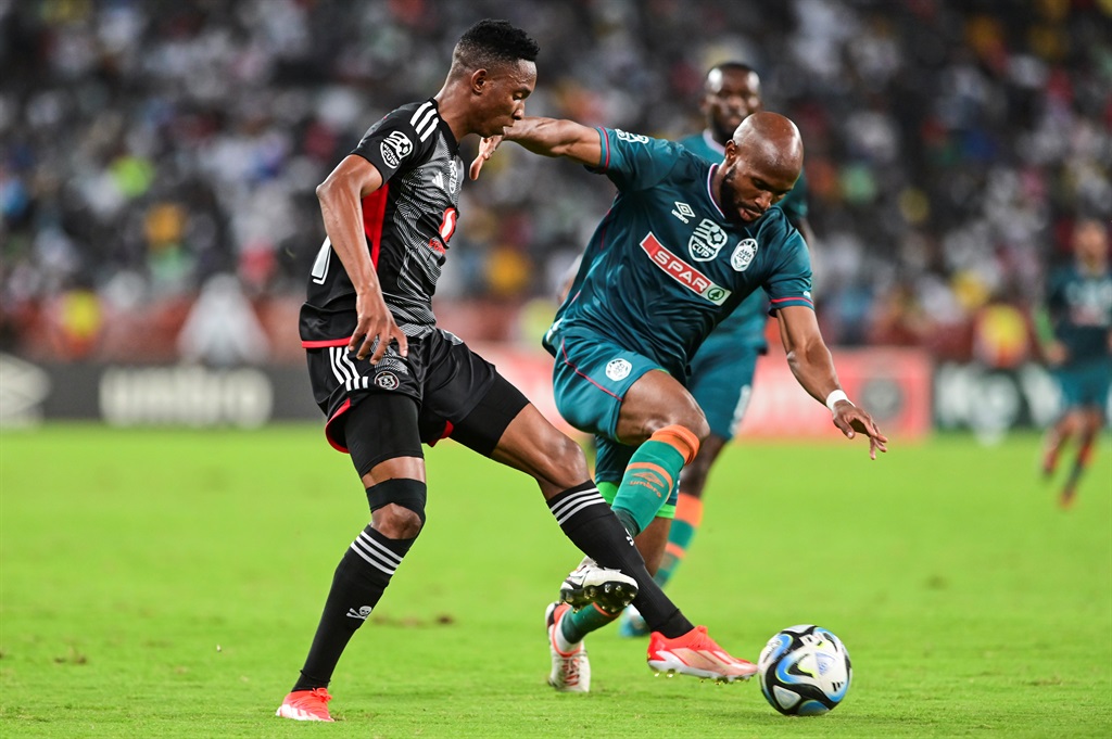DURBAN, SOUTH AFRICA - APRIL 13: Mbatha Thalente of Orlando Pirates and Ramahlwe Mphahlele of AmaZulu FC during the Nedbank Cup, Quarter Final match between AmaZulu FC and Orlando Pirates at Moses Mabhida Stadium on April 13, 2024 in Durban, South Africa. (Photo by Darren Stewart/Gallo Images)