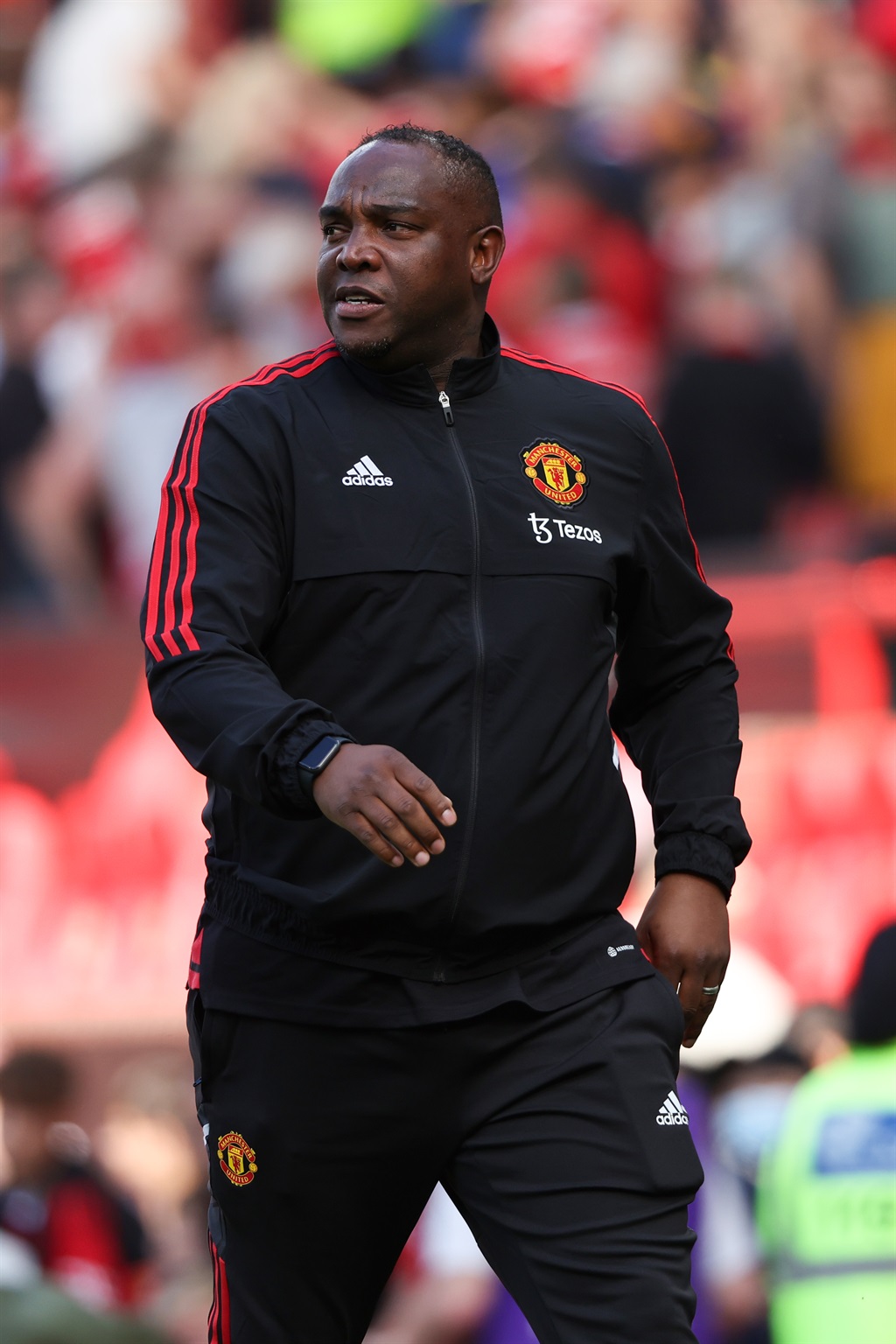 MANCHESTER, ENGLAND - JULY 31: Benni McCarthy  first-team coach at Manchester United during the pre-season friendly between Manchester United and Rayo Vallecano at Old Trafford on July 31, 2022 in Manchester, England. (Photo by Matthew Ashton - AMA/Getty Images)