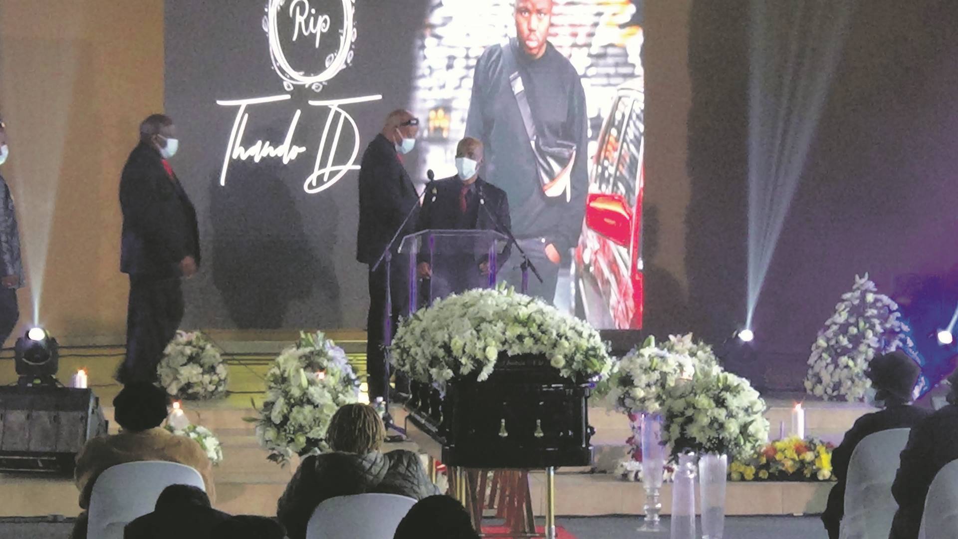 Family and friends gathered to bid farewell to Thando Khunjwa at his funeral. Photo by Lucky Morajane