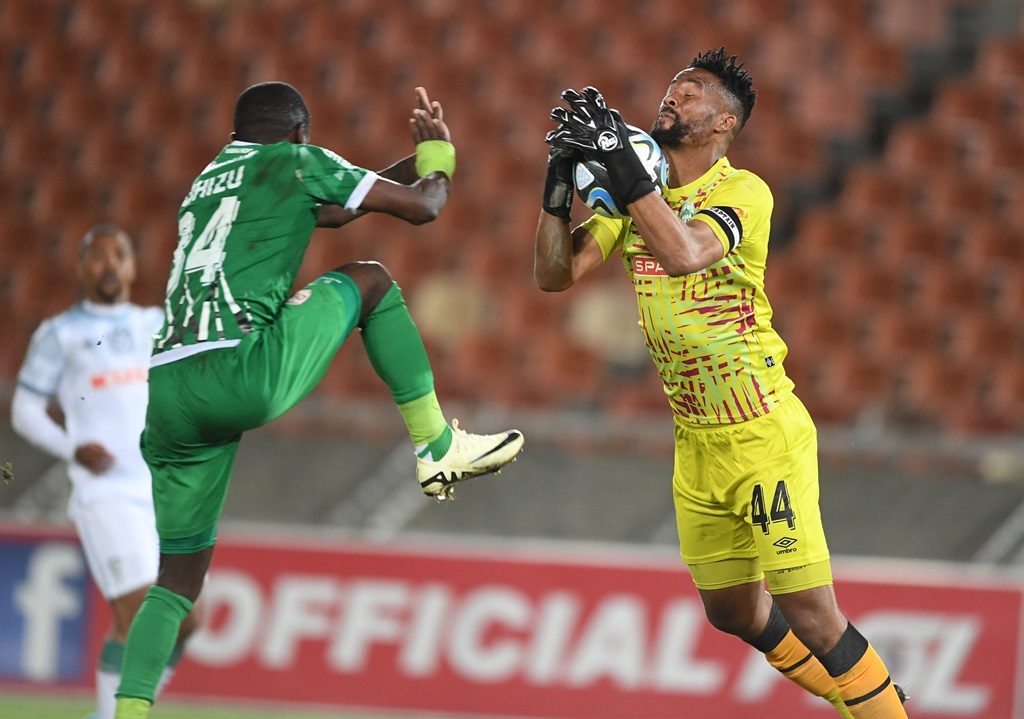 POLOKWANE, SOUTH AFRICA - MARCH 14: Chibuike Ohizu of Sekhukhune United and Veli Mothwa of AmaZulu FC during the Nedbank Cup, Last 16 match between Sekhukhune United and AmaZulu FC at Peter Mokaba Stadium on March 14, 2024 in Polokwane, South Africa 