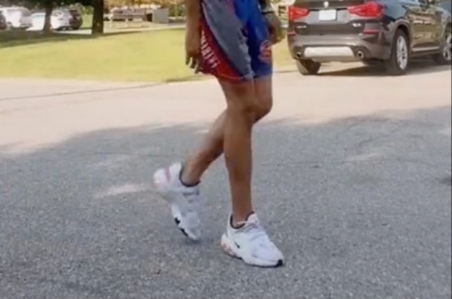 Chozen's White Nike tennis shoes during a TikTok v