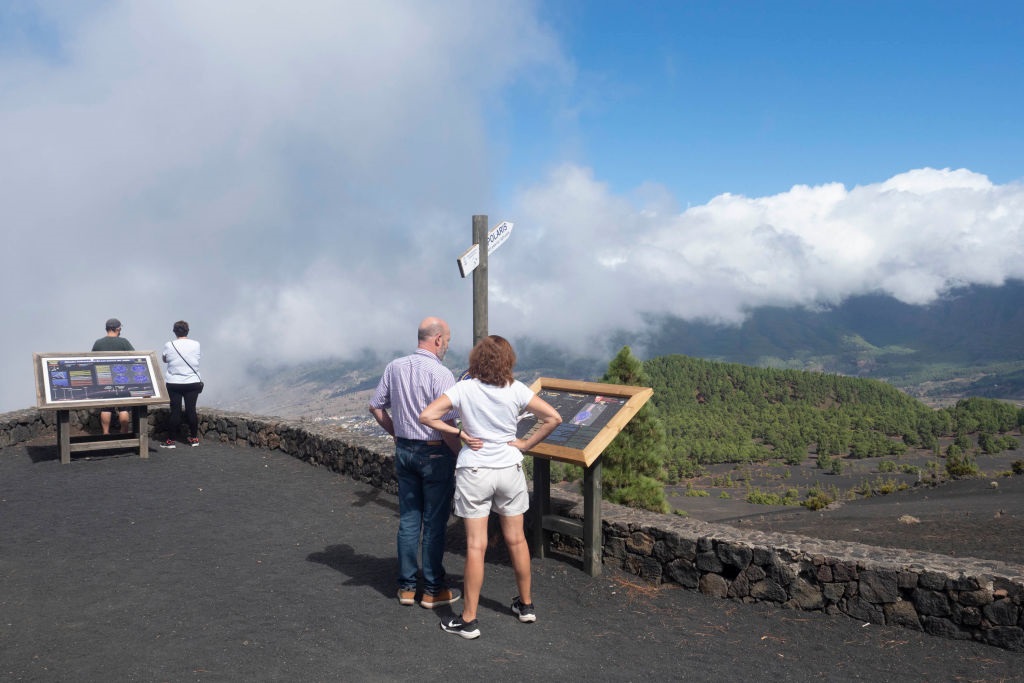 Several people at the Cumbre Vieja viewpoint days before the eruption in La Palma. (Photo By Europa Press via Getty Images)