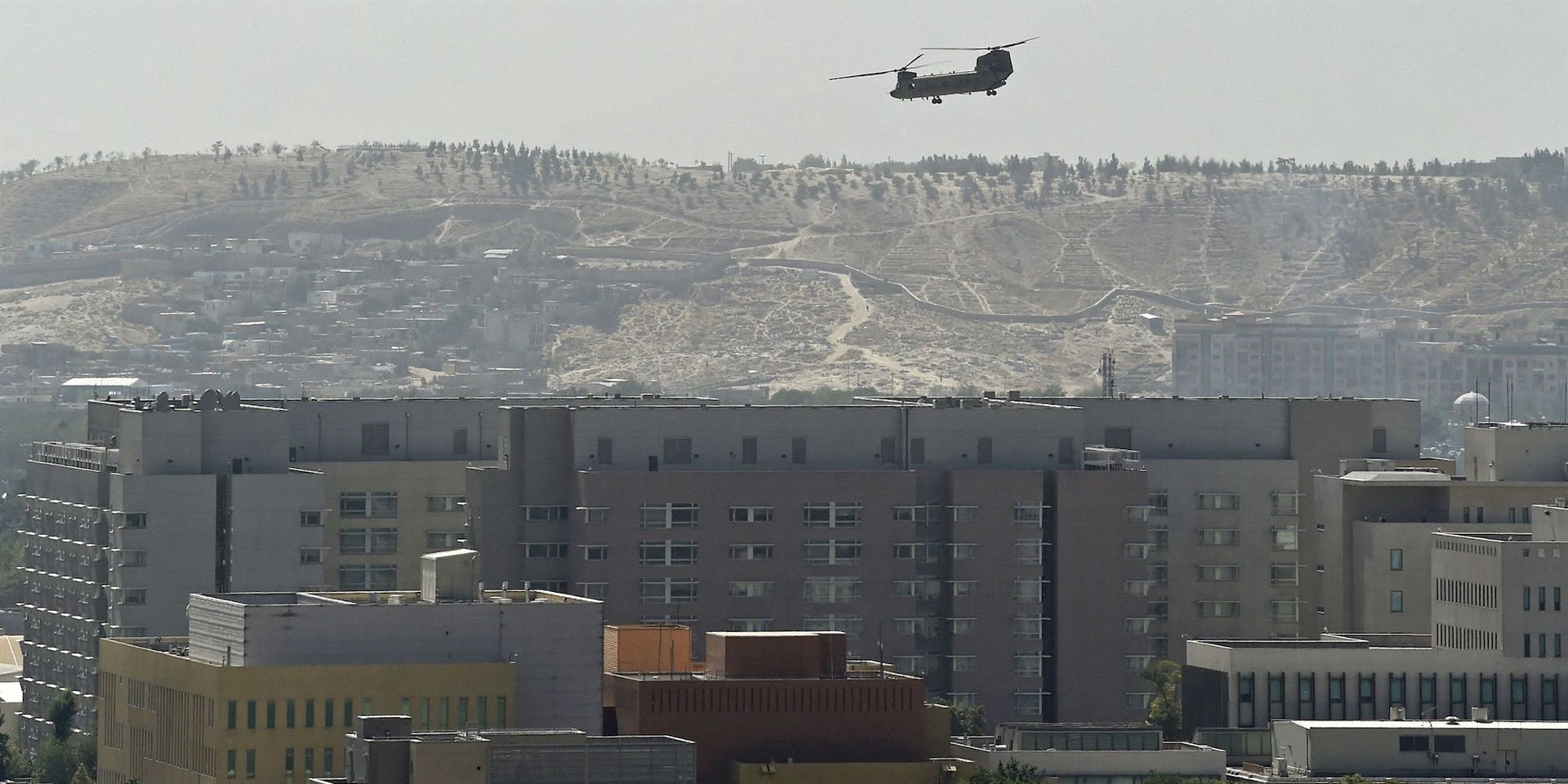 A US Chinook military helicopter flies above US em
