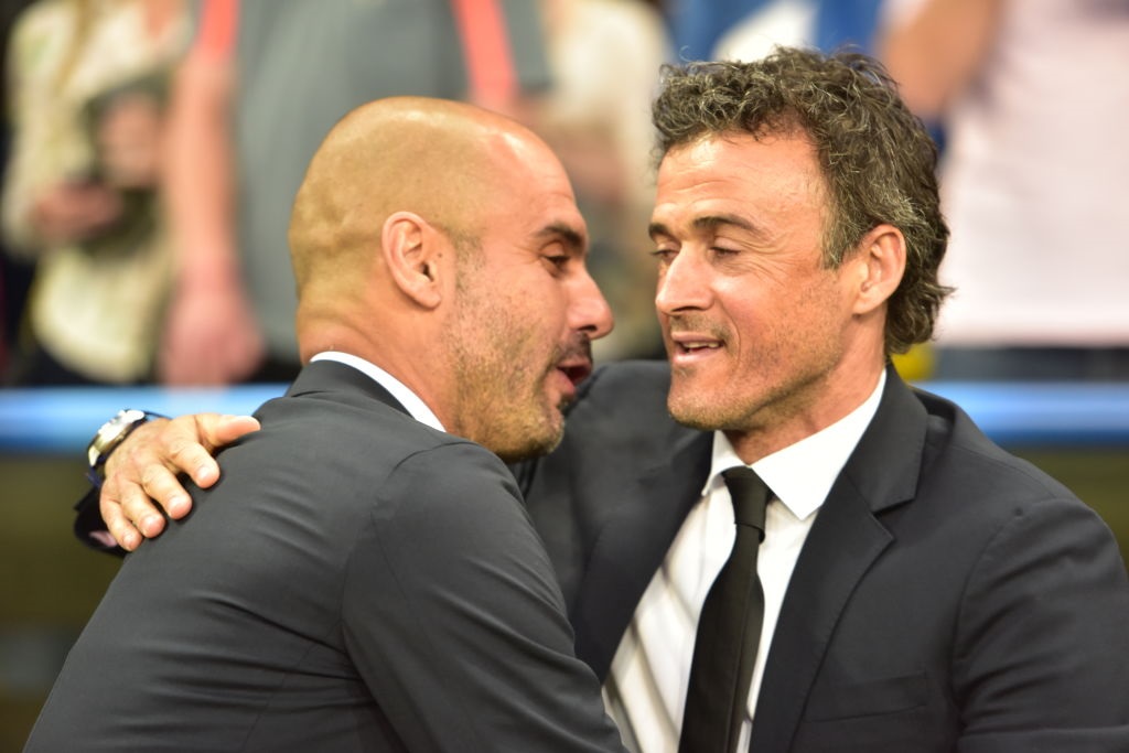 Bayern Munichs coach Pep Guardiola (l) and Barcelonas coach Luis Enrique hug prior to the  Champions League semi final soccer match FC Bayern Munich vs FC Barcelona in Munich, Germany, 12 May 2015.  Photo: Peter Kneffel/dpa | usage worldwide   (Photo by Peter Kneffel/picture alliance via Getty Images)