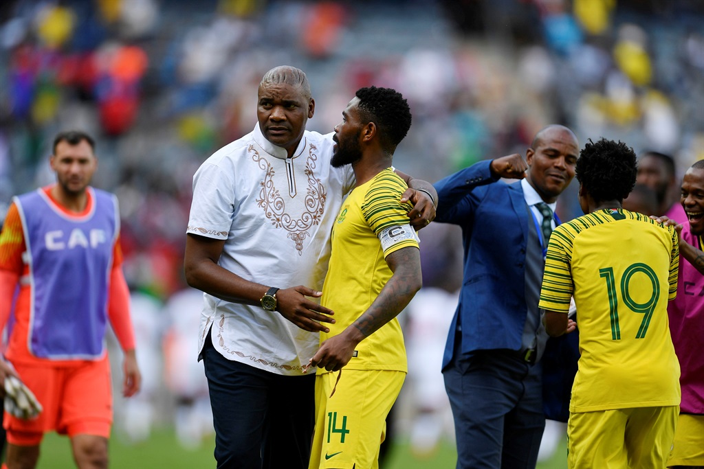 JOHANNESBURG, SOUTH AFRICA - NOVEMBER 17: Bafana Bafana coach Molefi Ntseki with Thulani Hlatshwayo during the 2021 Africa Cup of Nations Qualifiers match between South Africa and Sudan at Orlando Stadium on November 17, 2019 in Johannesburg, South Africa. (Photo by Lefty Shivambu/Gallo Images)