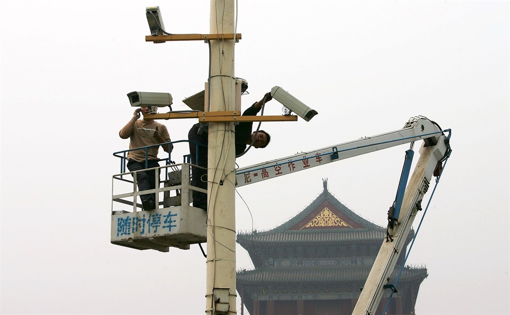 Cameras are installed at Tiananmen Square in Beijing in 2005. (Guang Niu/Getty Images)
