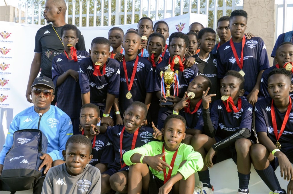 Dlalisa Moyeni FC's under-13 team are the champions of the Dlalisa Moyeni Fellowship Games Tournament. Photo by Raymond Morare