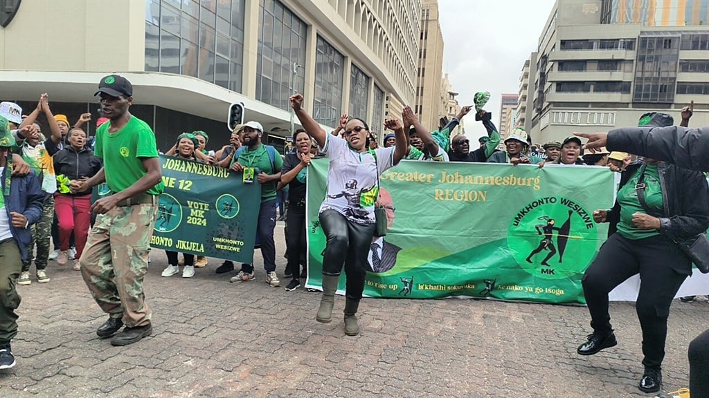MK members celebrating outside the High Court in Joburg after the judgment. Photo by Mfundekelwa Mkhulisi
