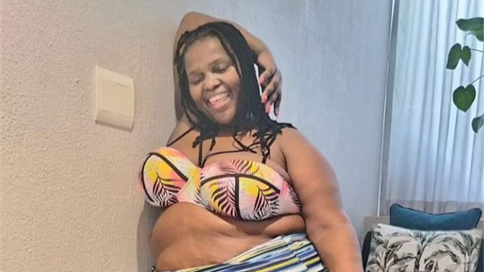 Poet and motivational speaker Mbangeni's swimwear photos have divided social media.