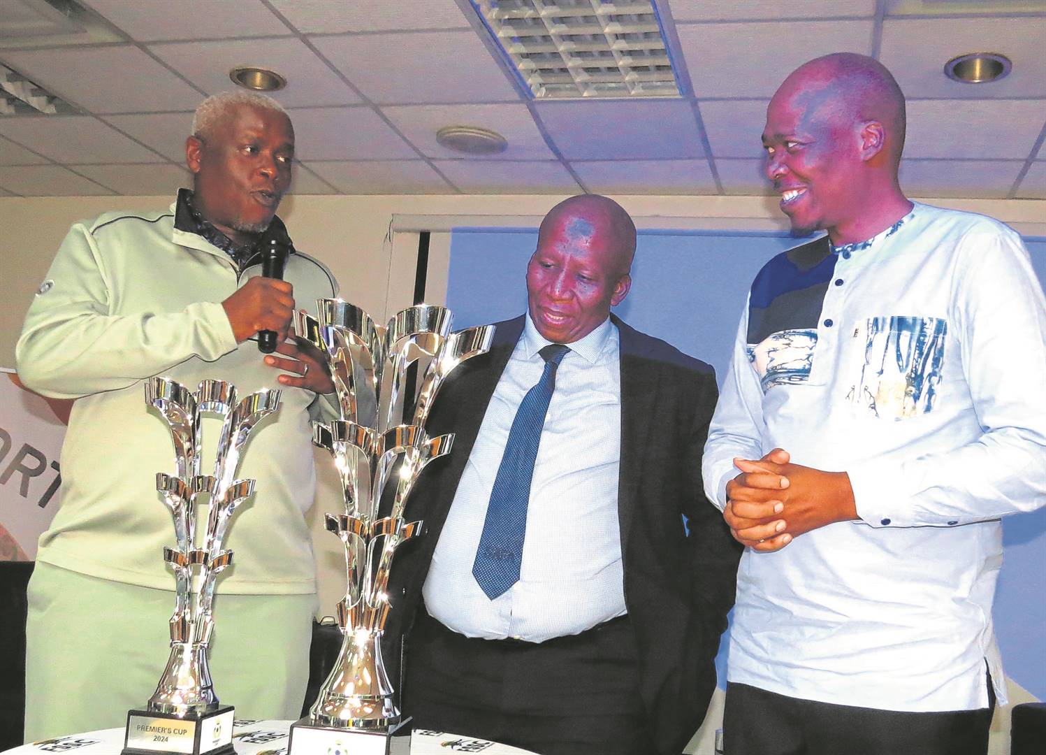 Free State Premier Mxolisi Dukwana (left) at the Premier’s Cup launch in Bloemfontein on 20 March, in association with Safa. With him are Safa representatives Thabo Monyane (middle) and Linda Zwane. photo: teboho setena