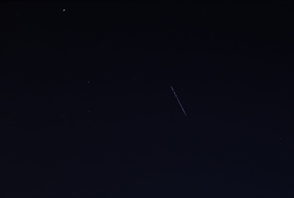 The passage of SpaceX Starlink satellites is observed in the skies of Gaziantep, Turkiye on September 01, 2023. (Photo by Mehmet Akif Parlak/Anadolu Agency via Getty Images)
