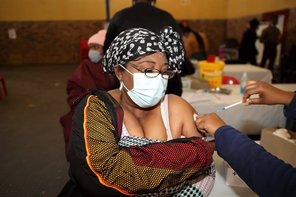 Citizens receive COVID-19 vaccination at Naledi Vaccination on August 30, 2021 on August 25, 2021 in Soweto, South Africa.  (Photo by Gallo Images/Papi Morake)