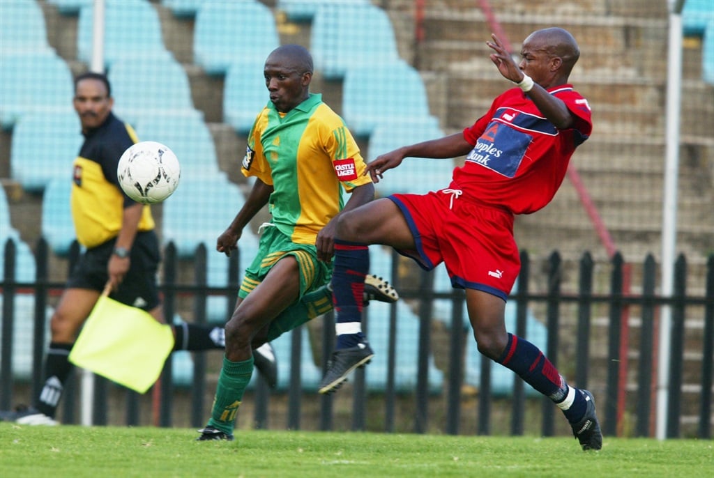 27 April 2001, PSL Season, Jomo Cosmos v Golden Arrows Rand Stadium, Johannesburg in South Africa. Bonang Ngaka of Arrows and Lucky Mhlathi of Cosmos in action Photo Credit: - Duif du Toit/Gallo Images