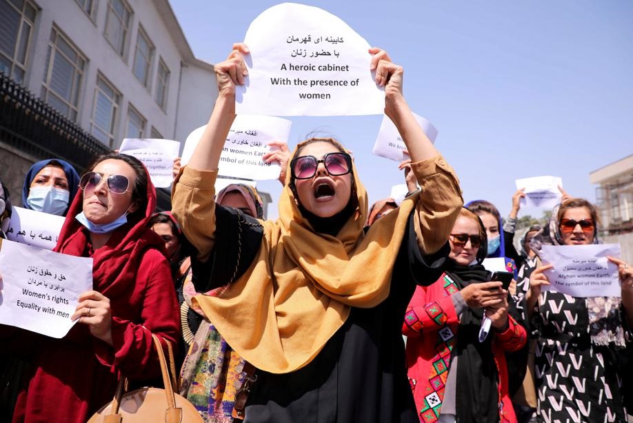 Afghan women's rights defenders and civil activists protest to call on the Taliban for the preservation of their achievements and education, in front of the presidential palace in Kabul, Afghanistan on September 3 2021. Photo: Stringer/Reuters