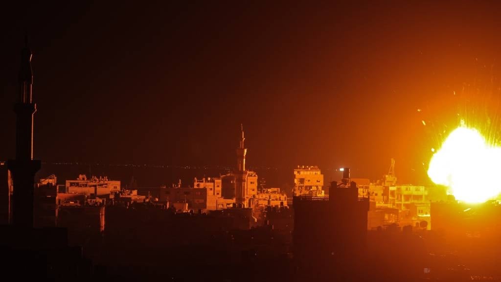 A fireball erupts during Israeli bombardment on Rafah, in the southern Gaza Strip, amid ongoing battles between Israel and the Palestinian militant group Hamas. (Said Khatib/AFP)