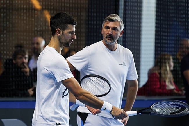 Novak Djokovic (L) talks with his coach Goran Ivanisevic during a training session at the ATP Finals in Turin, Italy on 17 November 2023. (Shi Tang/Getty Images)