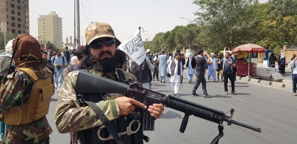 Taliban members patrol Kabul. 
