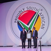 Multichoice accepts certificate at 12th proudly SA localisation dinner