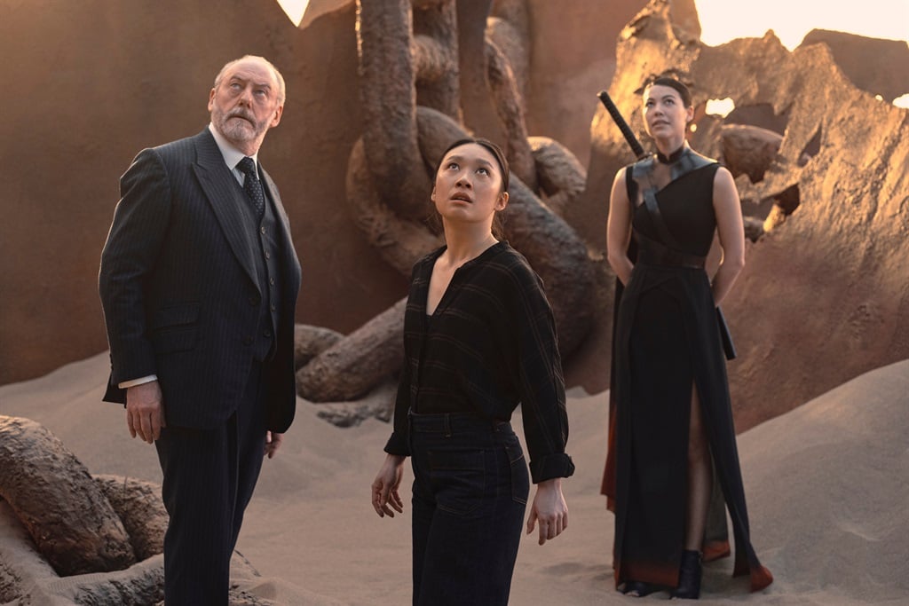 Liam Cunningham as Wade, Jess Hong as Jin Cheng and Sea Shimooka as Sophon in 3 Body Problem. (Ed Miller/Netflix © 2024)