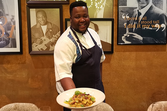 Chef Mahle Mihlali Vellem from Leloko Bistro at Sun City's Sun Vacation Club with his Cape Malay pickled fish. 